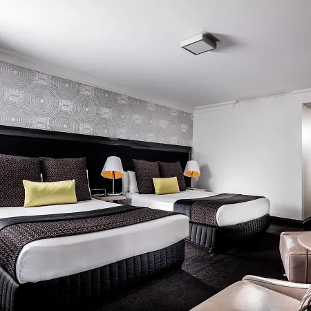Pullman Brisbane King George Square Hotel Exterior photo A room at the hotel
